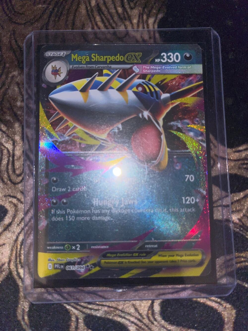 Mega Sharpedo ex from Pokémon: Mega Evolution – Phantasmal Flames expansion set.